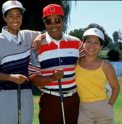 Kultida Woods with her husband Earl Woods and son Tiger Woods